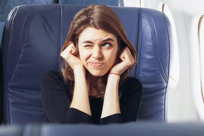 Por que a goma de mascar ajuda da congestão ouvidos no avião?